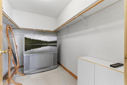Primary Walk-In Closet (TV is in there "for storage")