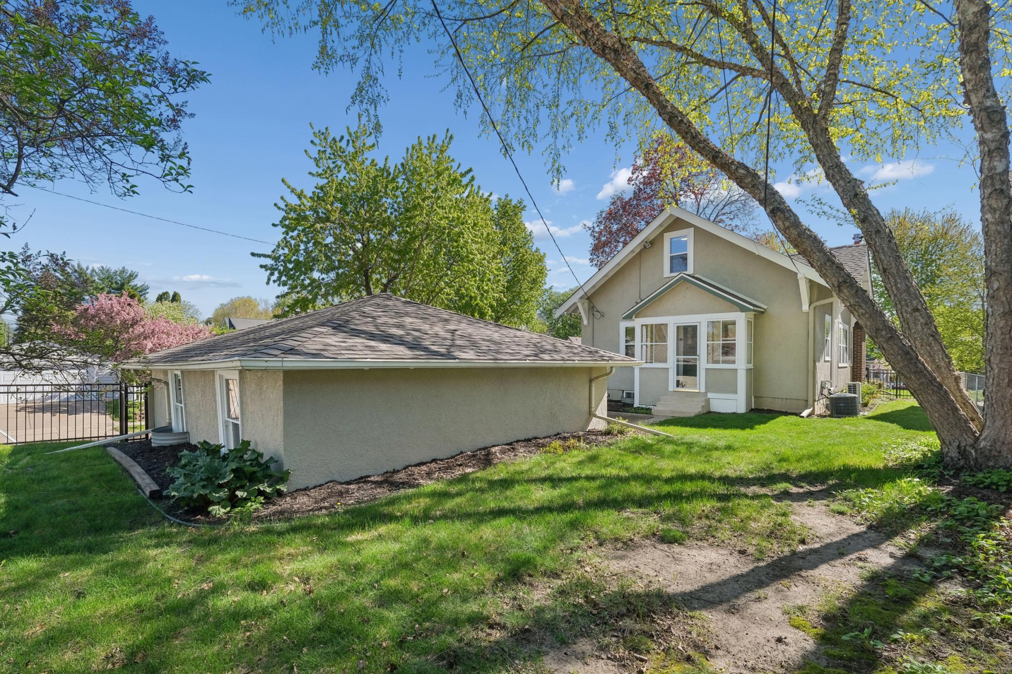 Plenty of yard for perennials, outdoor fun, and pets (fully fenced in back).
