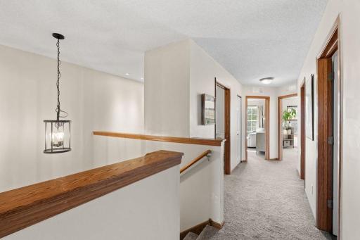 Upper level includes 3 bedrooms plus loft.