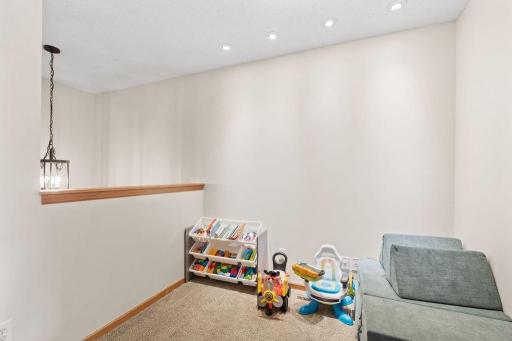 Flexible upper level loft for work, play, or relaxing.