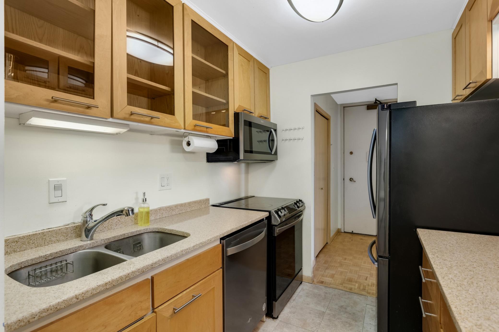 Kitchen with newer stainless steel appliances