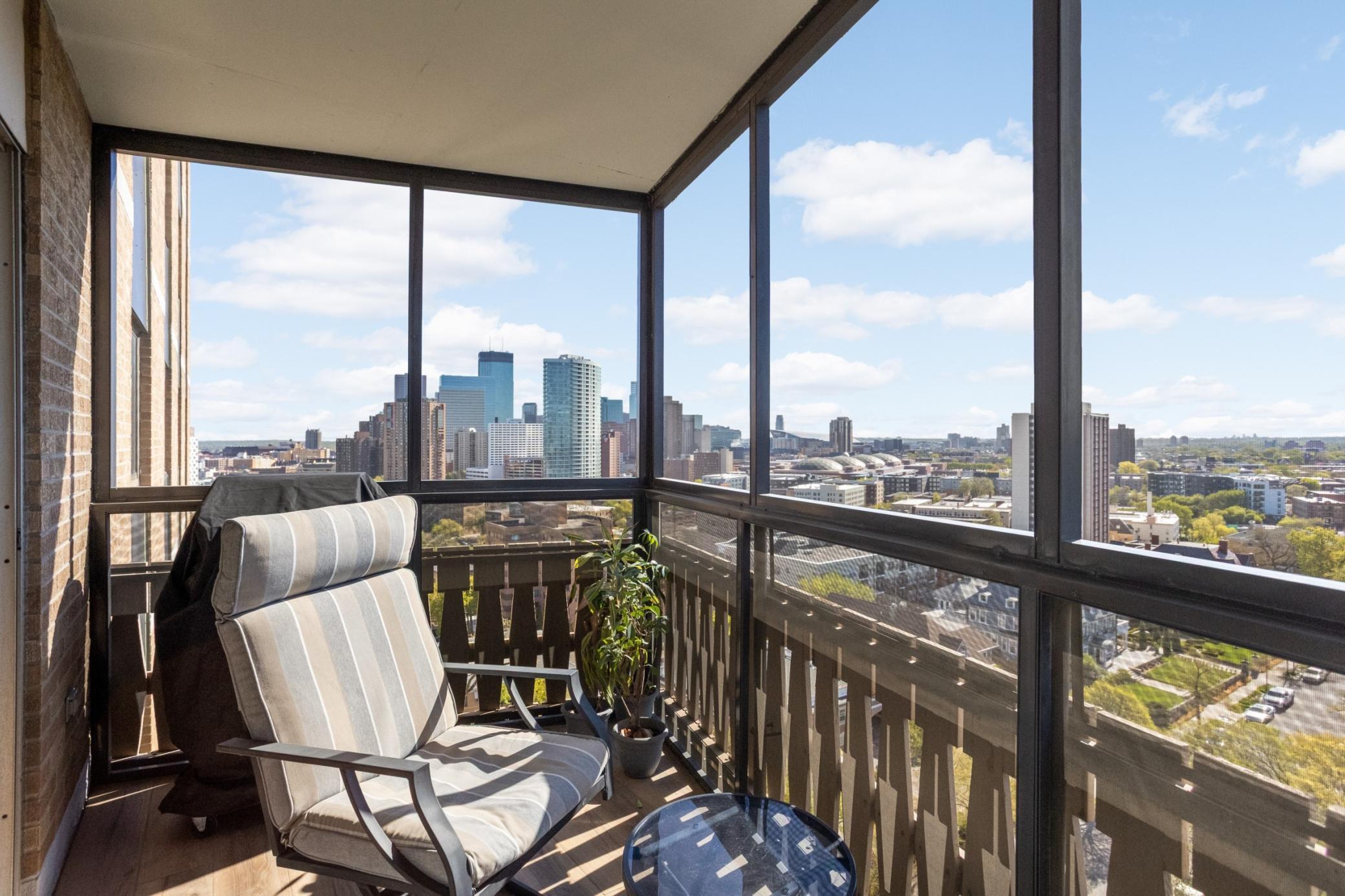 Private screened-in balcony with views of downtown!