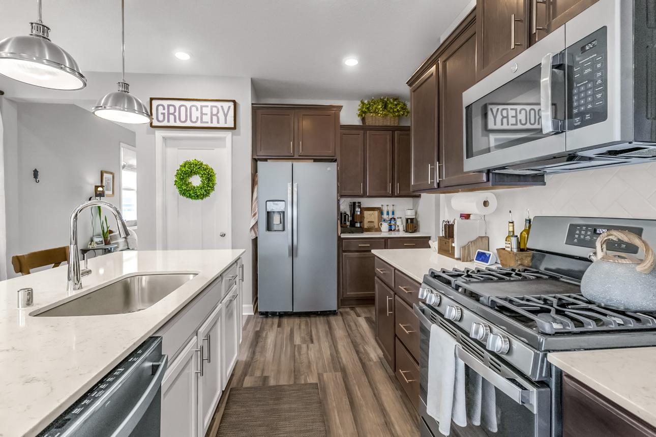 Hardwood cabinets & graphite stainless appliances