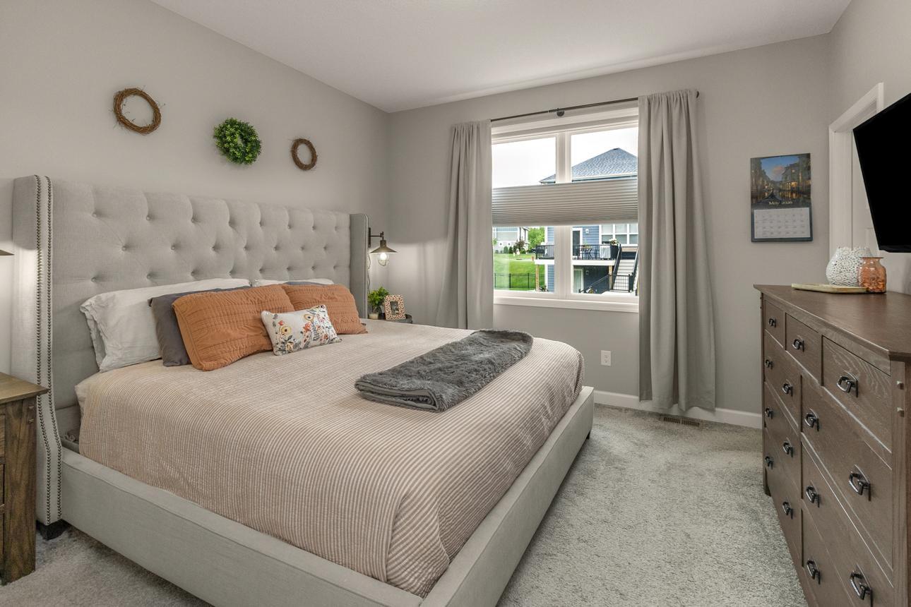 Primary Bedroom overlooking backyard