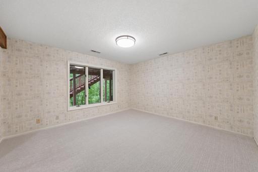 Rear facing lower level office or fifth bedroom.