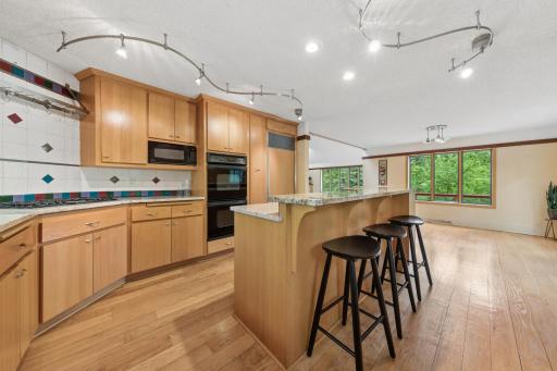 Perfect flow from kitchen to dining to living to loft. Living here just makes sense!