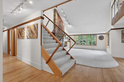 Light, bright, and open concept! The main level is stunning! Brand new carpet and real wood floors.