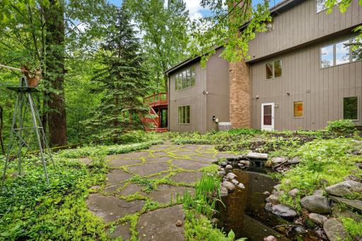 Yes, the back yard is a special as they come. .80 acres backing to a large pond and with your own paver patio and water rock flow feature.