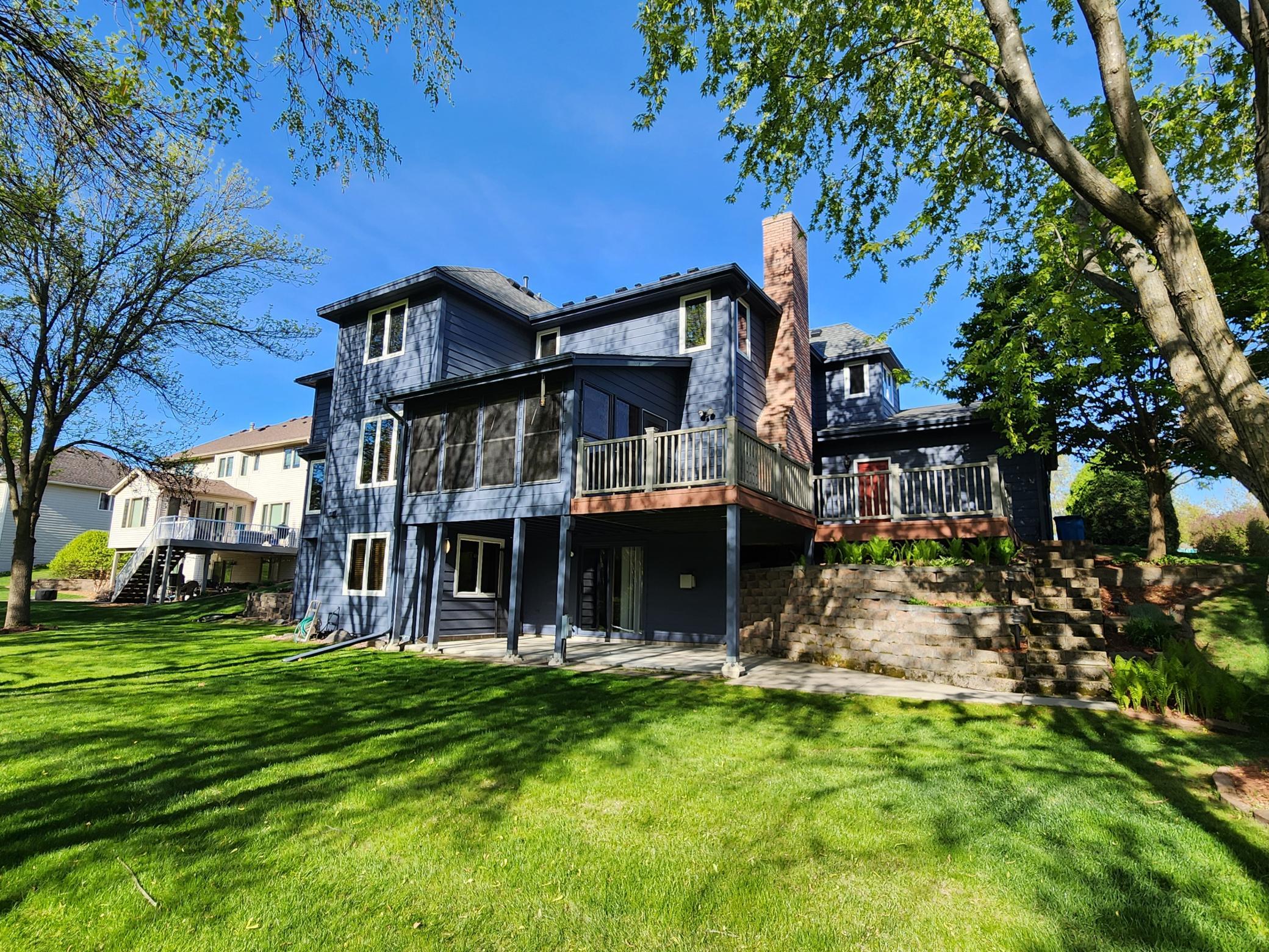 All 3 levels of this walkout 2 story are finished. There are 4 bedrooms on the upper level, a 5th bedroom AND den/office in the lower level.