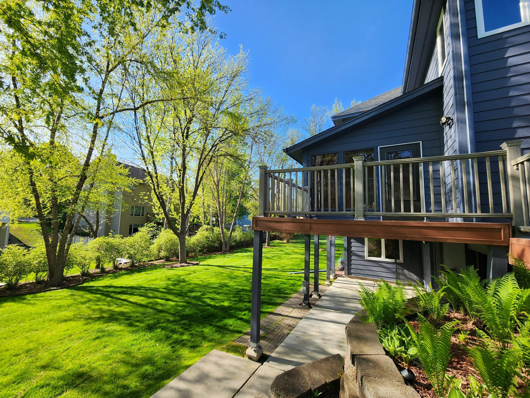 FLAT, USABLE, tree-lined back yard!