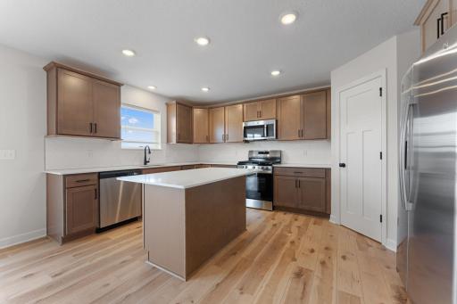 *** Ready Sept 2026 ***. Photo of similar home for reference only. Colors and selections will vary. Kingston floorplan. All GE SS appliances included! Soft close cabinets & drawers throughout!