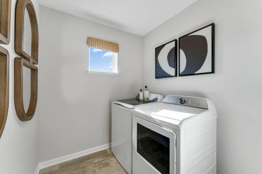 Photo of similar home for reference only. Colors and selections will vary. Kingston floorplan. Upper level laundry including GE washer/dryer!