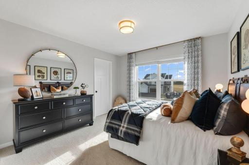 Photo of similar home for reference only. Colors and selections will vary. Kingston floorplan. Upper level bedroom 2.