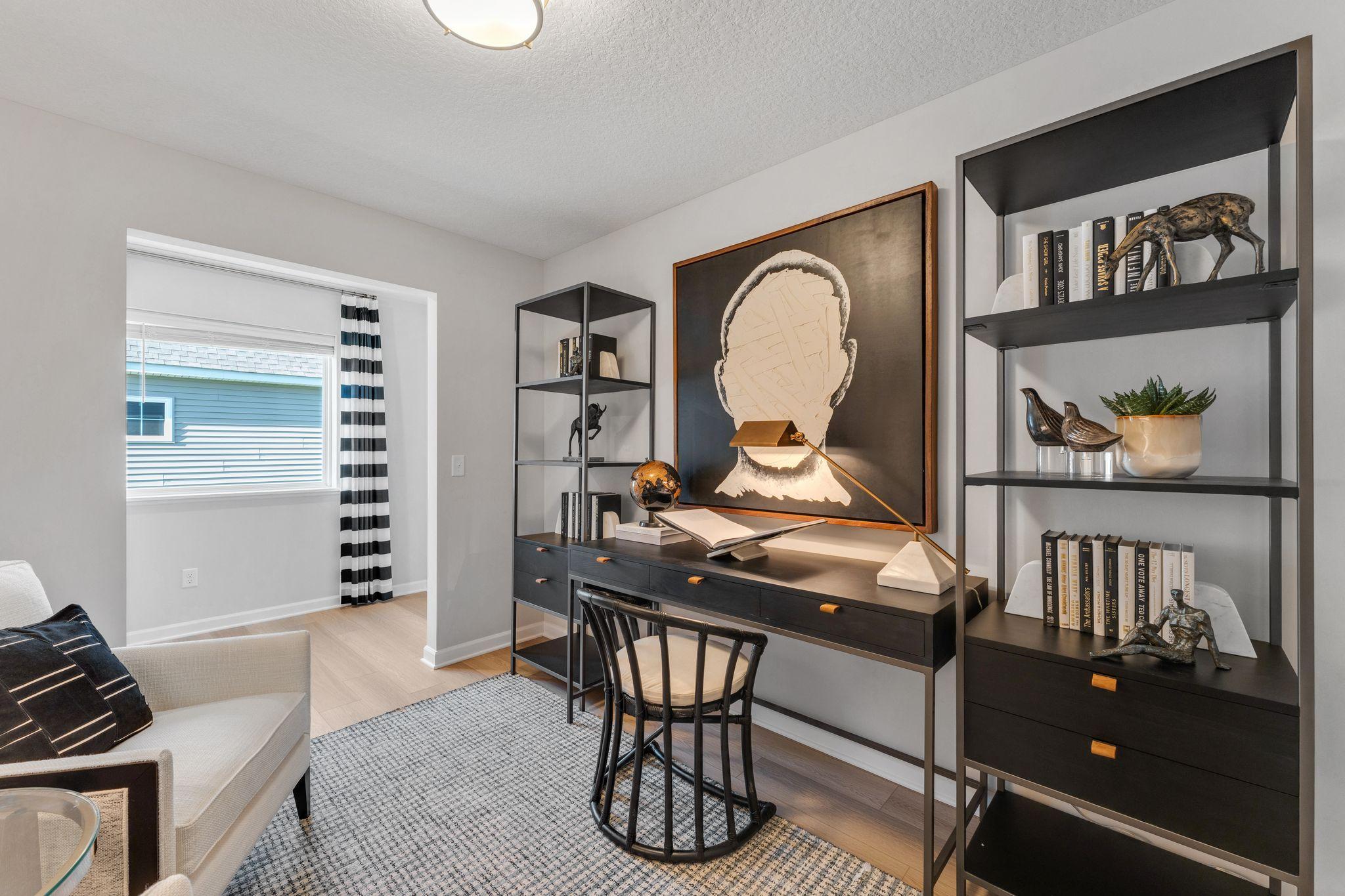 Photo of similar home for reference only. Colors and selections will vary. Kingston floorplan. Main level flex room, perfect for home office or craft room!