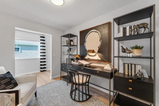 Photo of similar home for reference only. Colors and selections will vary. Kingston floorplan. Main level flex room, perfect for home office or craft room!