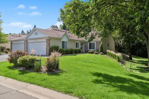 Beautiful curb appeal with lush landscaping