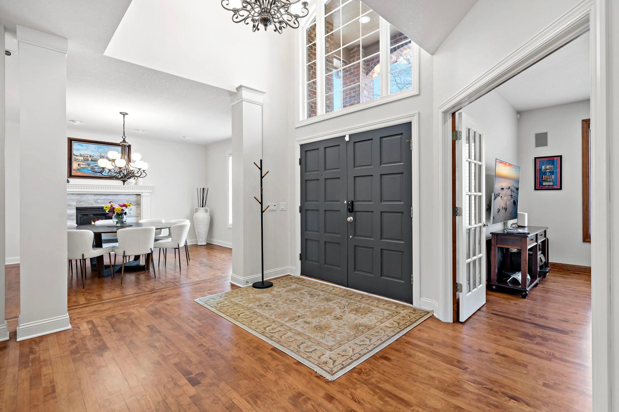 You will recognize the quality and elegance from the moment you step foot into this incredible home! Soaring ceilings, gorgeous hardwood floors, meticulous details and upgrades throughout!