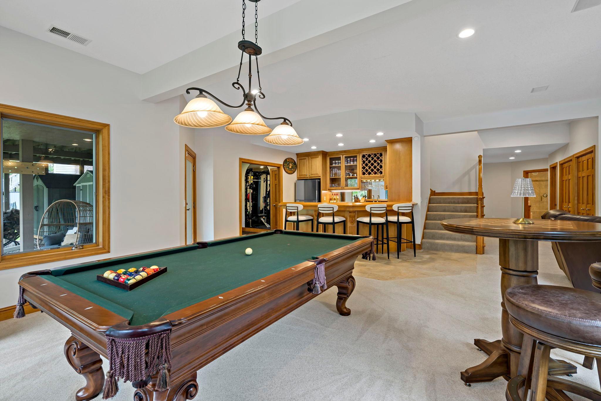 Amazing lower level! Features a huge recreation/family room with fireplace, a wet bar, luxury full bathroom with steam shower, spacious 5th bedroom and a large gym/6th bedroom