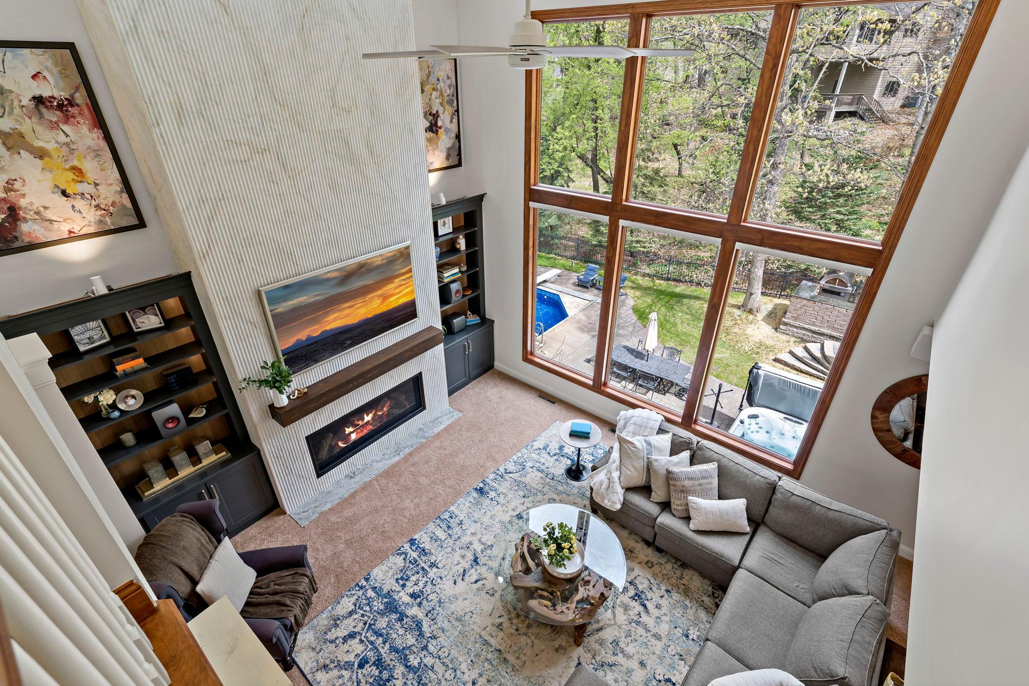Stunning view of the living room and backyard from the upper level catwalk