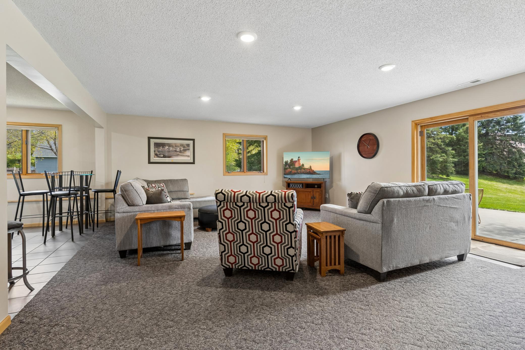 Large family room walks out to backyard.