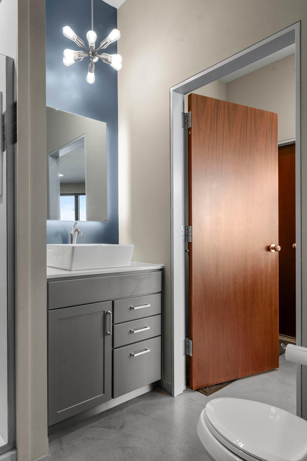 Convenient bathroom access from the hallway and the bedroom
