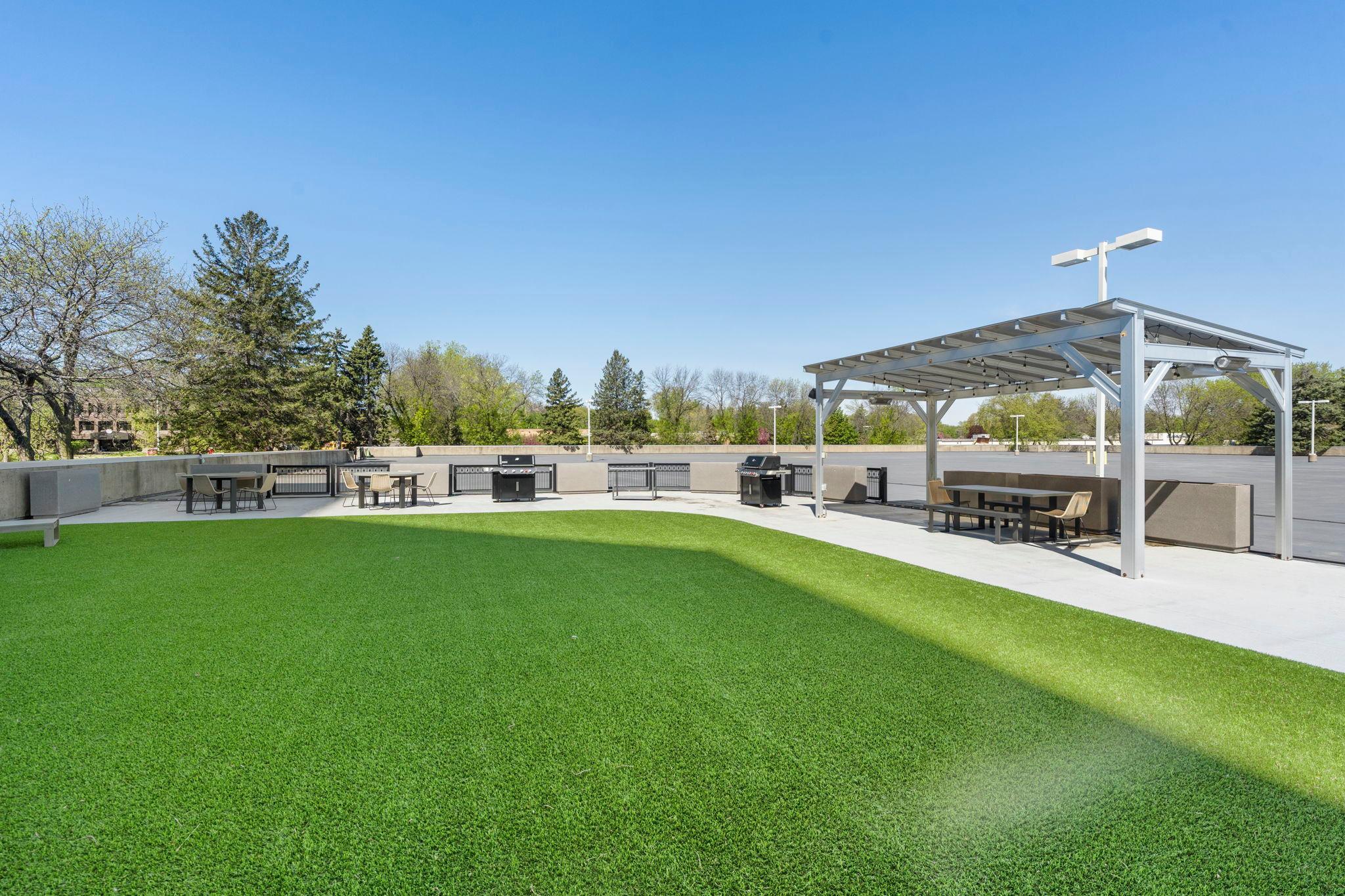 A spacious outdoor grilling and patio area provides the ideal place to enjoy the outdoors