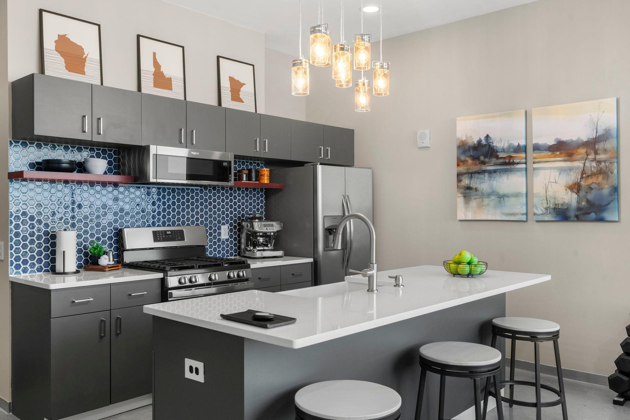 The kitchen serves as a stunning centerpiece of the living area