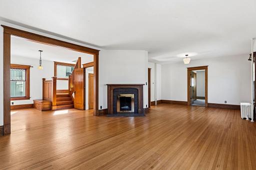 This living/dining room is all the more cozy with a wood-burning fireplace.