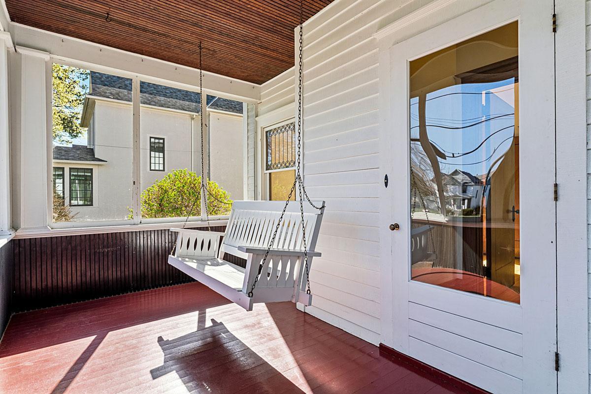 A classic front porch with, of course, a porch swing.