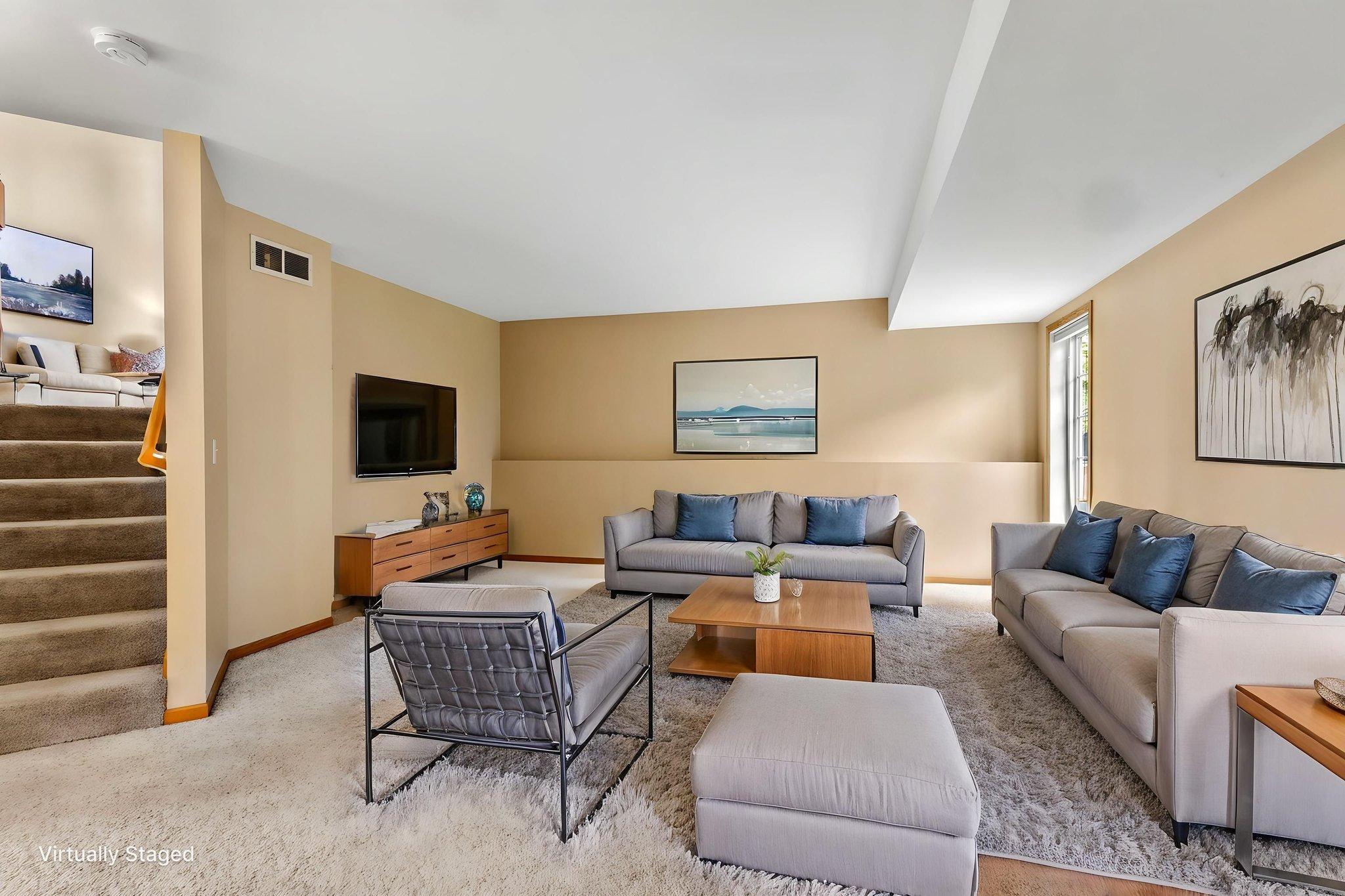 Lower level family room virtually staged