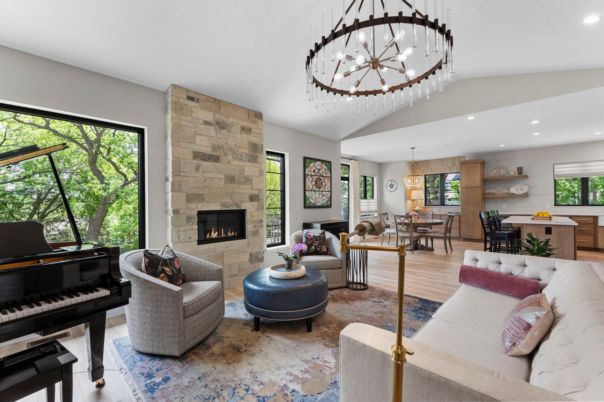 Living room with large windows and fireplace