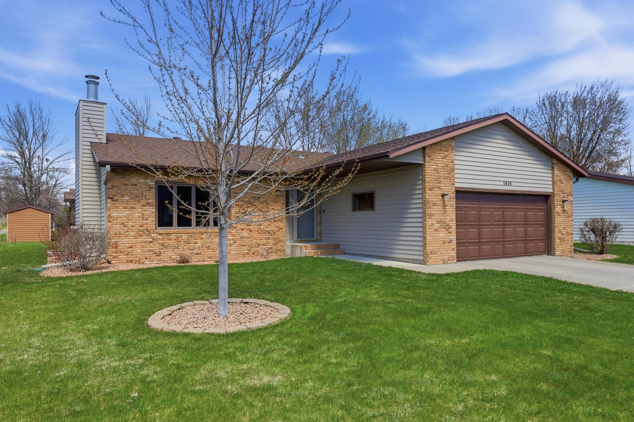 Front of Home- Steel & Brick Siding