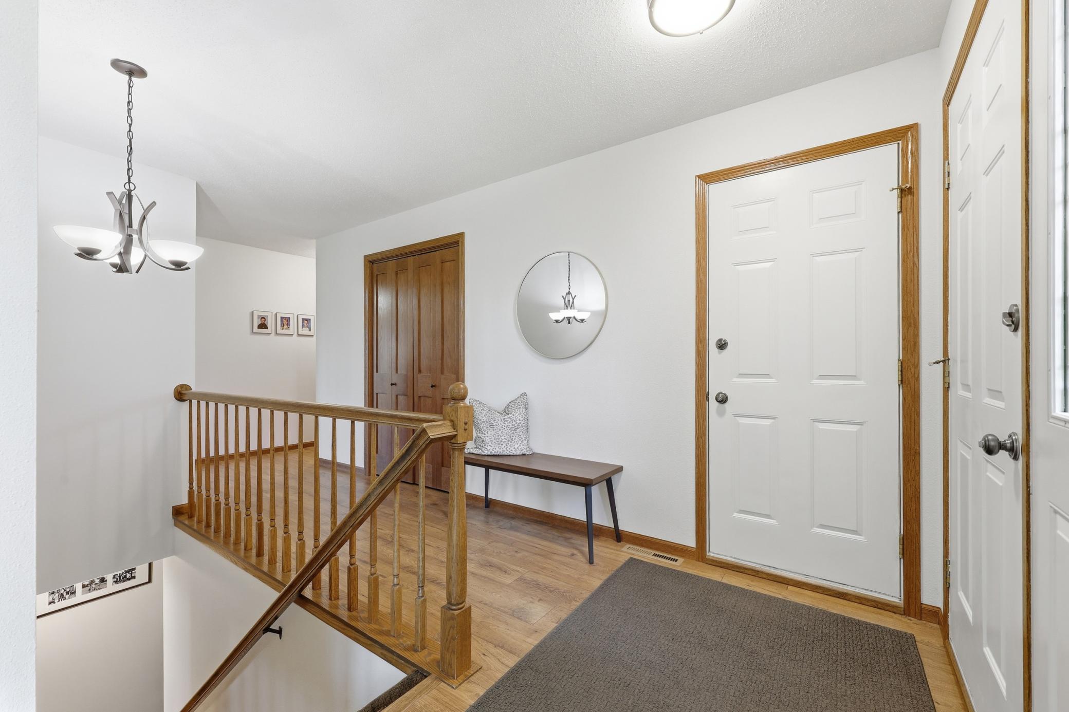 Front Entry- Coat Closet and access to attached 2 stall