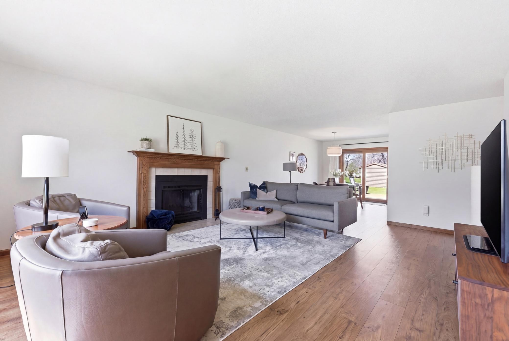Main Floor Living Room- Wood Burning Fireplace
