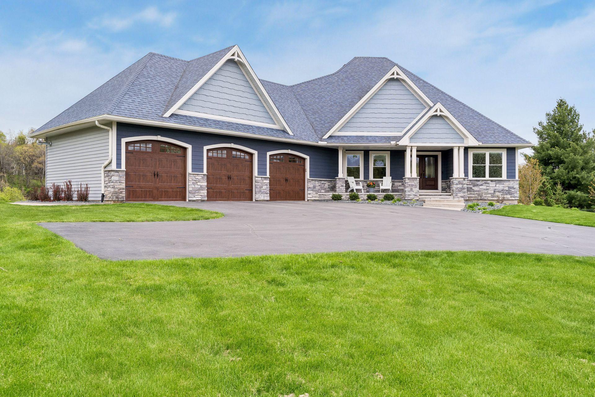 Beautiful curb appeal with maintenance-free exterior, oversized heated 3-car garage, professional landscaping, and expansive driveway. Luxury rambler designed for comfort, functionality and modern living.