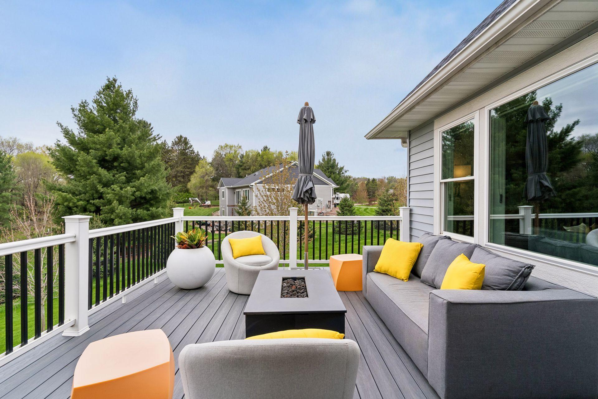 Maintenance-free deck with peaceful backyard views and space for outdoor dining, relaxing, and entertaining. Enjoy privacy, nature and a country-living feel in the city.