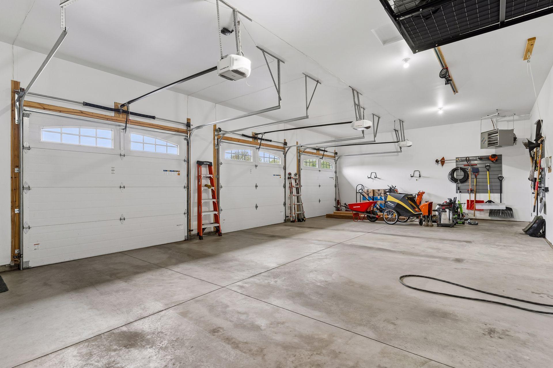 Oversized insulated and heated 3-car garage, built-in storage potential and electric vehicle charging setup. Perfect for cars, hobbies, tools and recreational equipment.