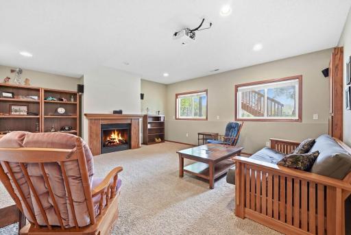 Lower level lookout basement comes equipped with projector and AV hookups for amazing theater room