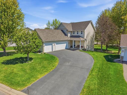 Beautiful curved driveway to your 3 stall garage