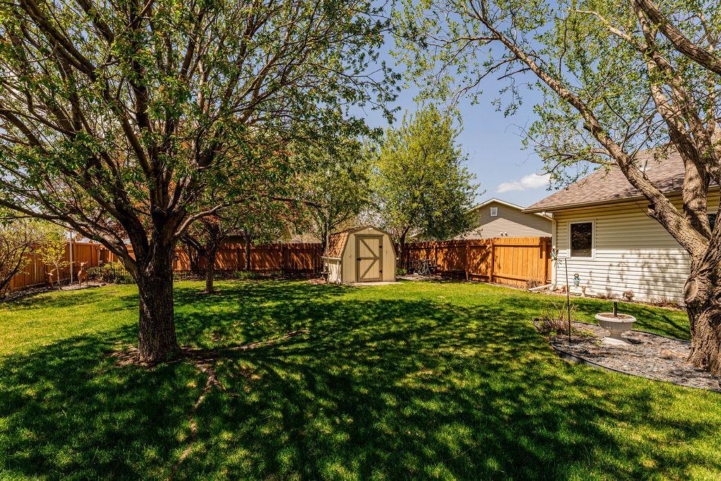 Storage shed, fully fenced yard