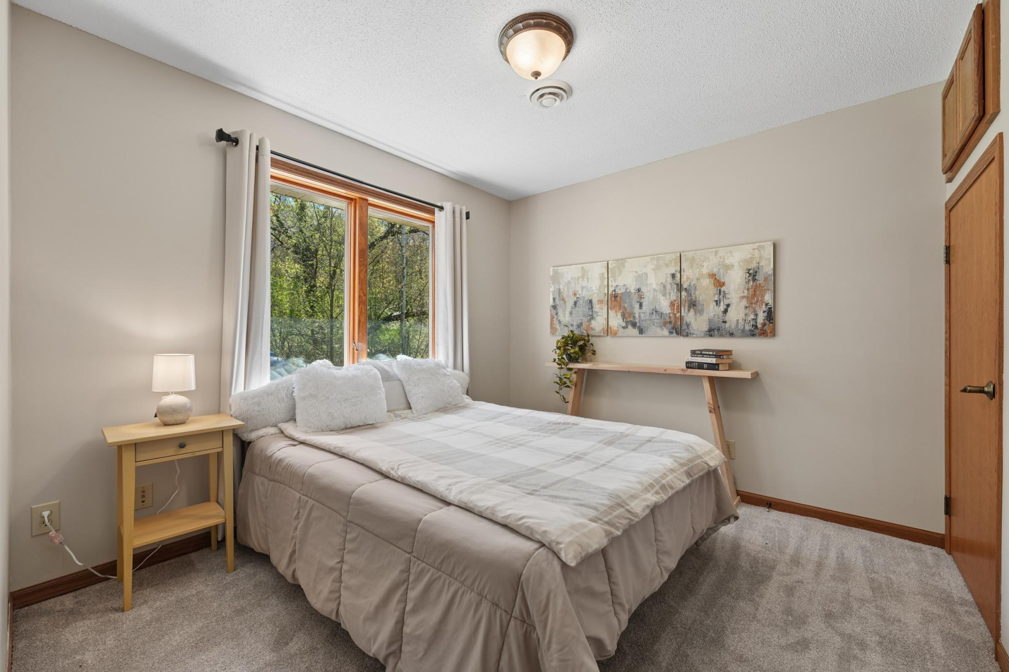 Nice size bedroom with closet and new carpeting