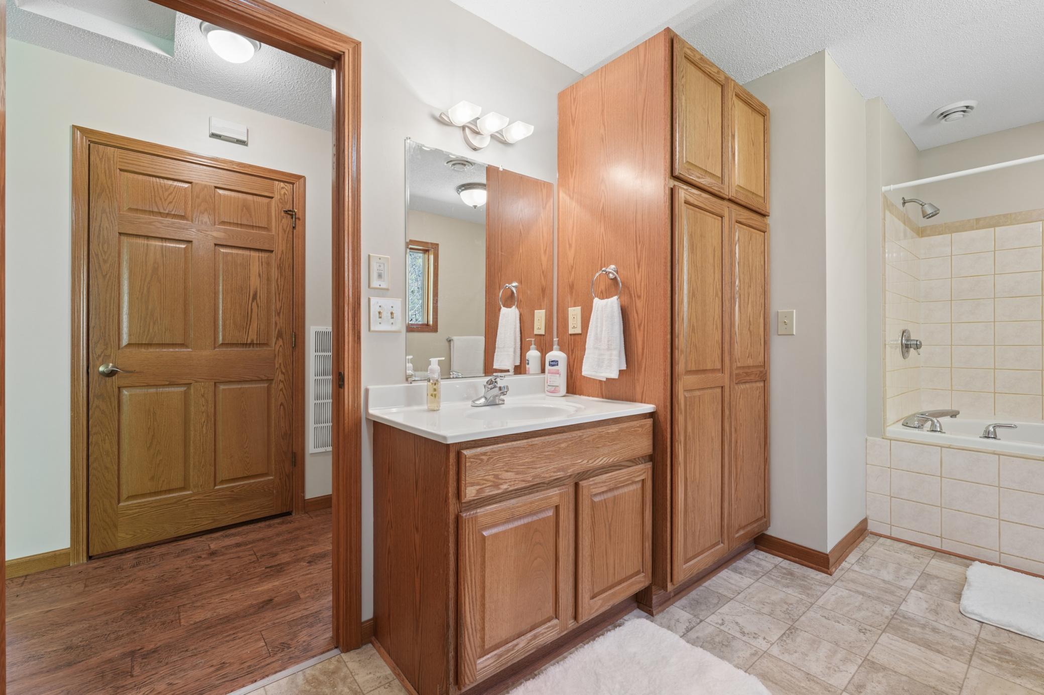Extra linen storage in the large vanity cabinet