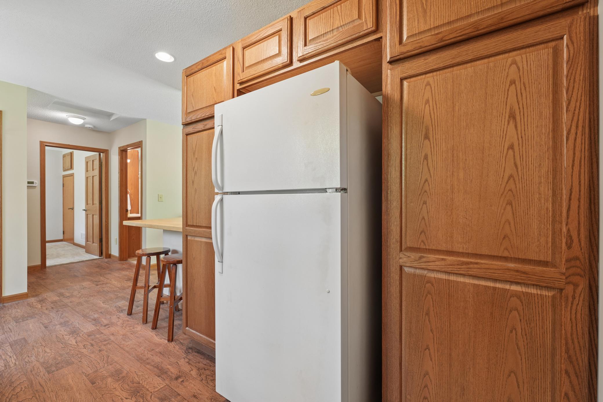 Beyond the kitchen is the bedroom and bath/laundry area