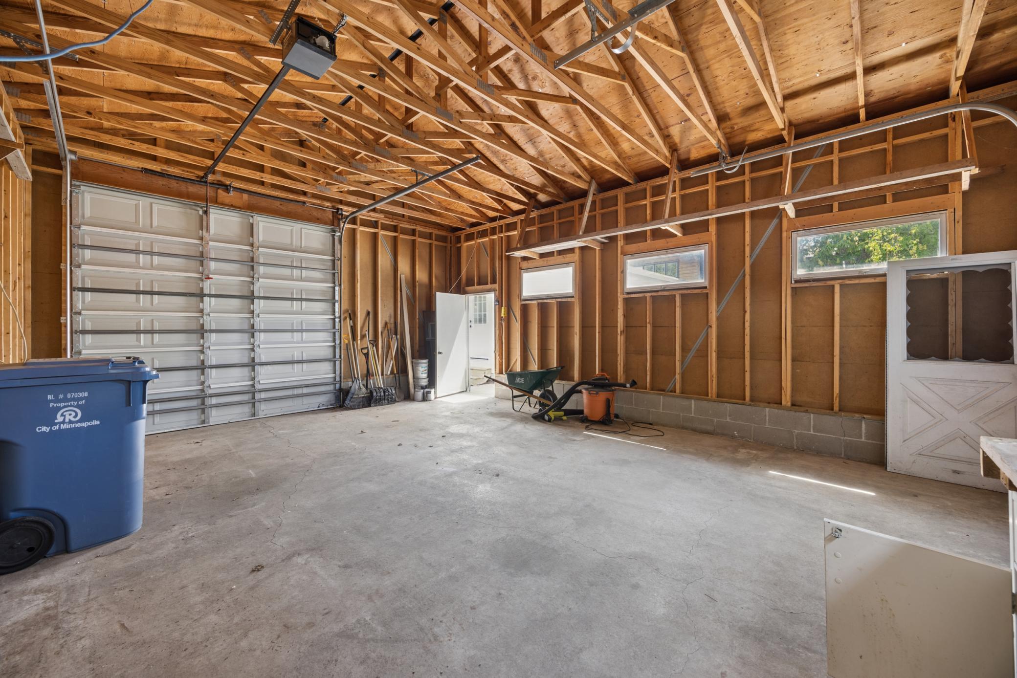 Large and tall garage with front and rear garage doors