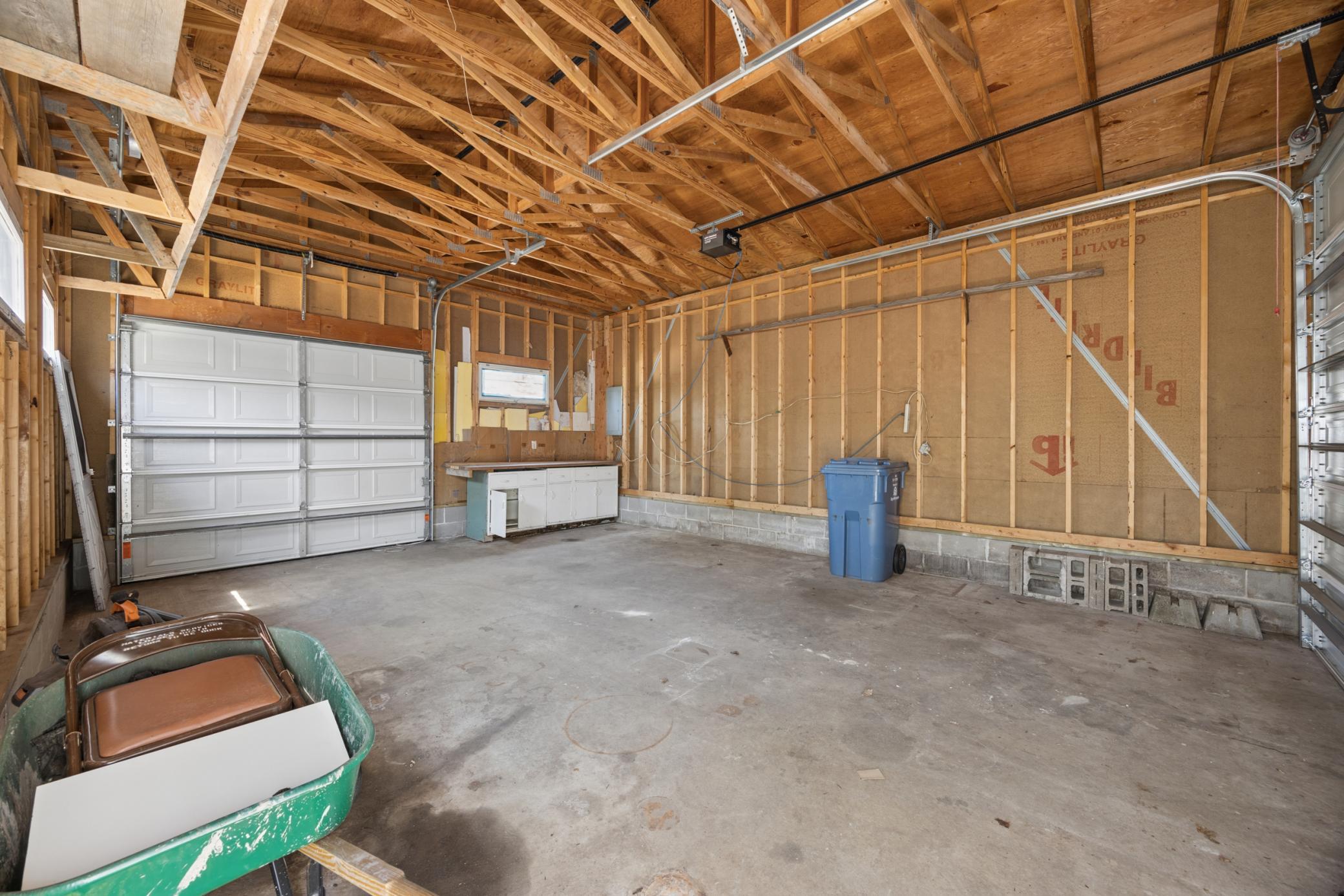 Large and tall garage with front and rear garage doors