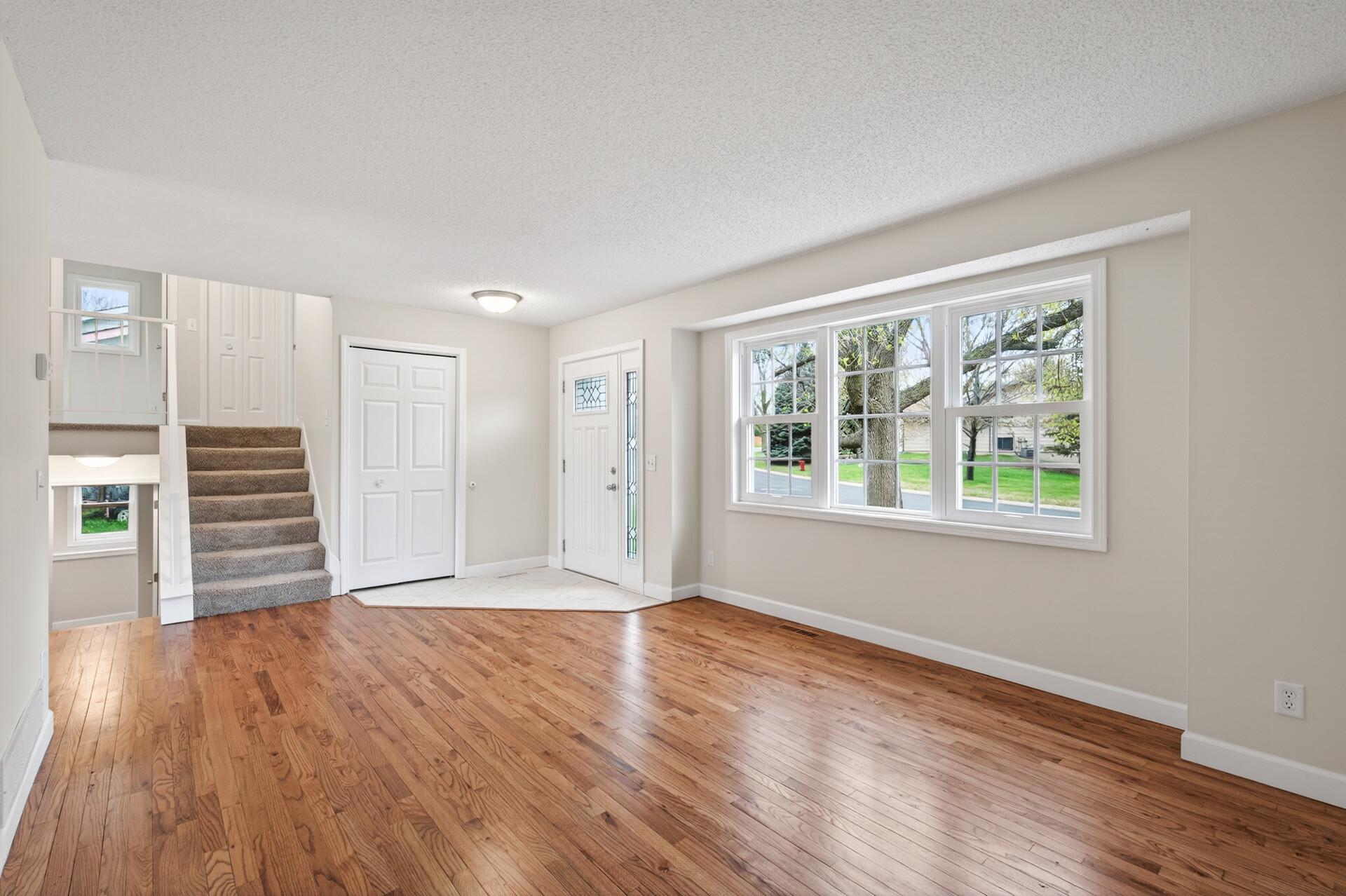 Refinished Gleaming Hardwood Floors!