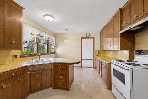 This kitchen holds tons of potential for your unique vision and creative touch. With its spacious layout and solid structure, it's ready to be transformed into the heart of the home.