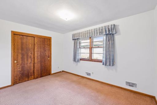 Fourth bedroom! Each room has plenty of closet space ideal for storing and organizing all your personal belongings.