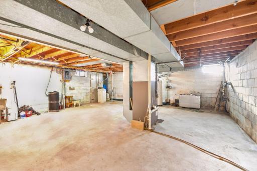 The unfinished basement provides excellent storage or future expansion possibilities.