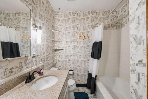 The full bathroom is convenient to all bedrooms and other living spaces making it ideal for guests and everyday use.